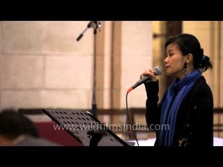 Ao Naga girl singing 'Have yourself a merry little Christmas'