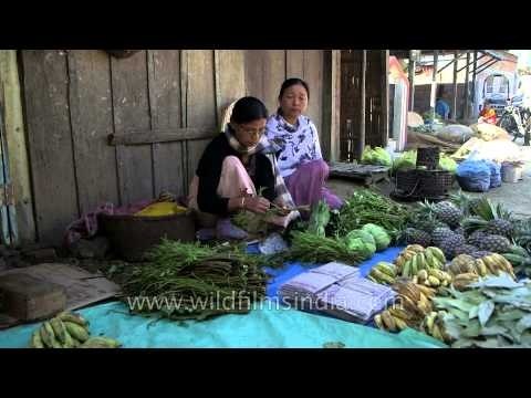 Woman selling local vegetables and fruits in Moirang Market of Manipur