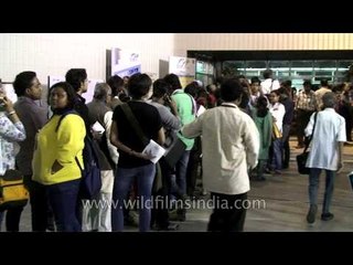 Cine goers wait in queue at 19th Kolkata International Film Festival, Kolkata
