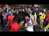 Gay participants dancing in the streets: Delhi Queer Pride