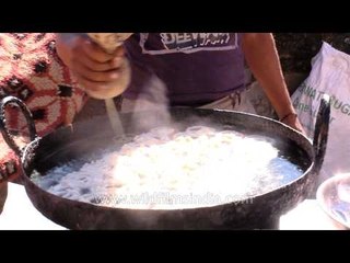 Funnel cake or Jalebi being made
