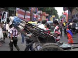 Traffic comes to a stand still in the crowded streets of Kolkata during Durga Puja