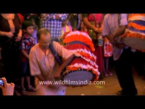 Crowds gather around the drummers: Maha Sashthi at CR Park
