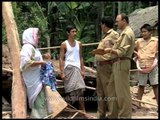 Police taking statements from witnesses about the destruction caused by wild elephants in Assam