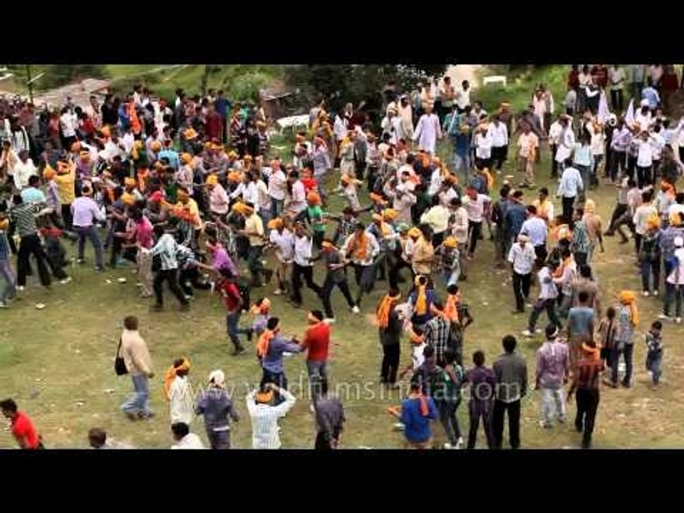 Mass gathering for bizarre festival of stone throwing