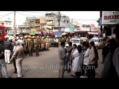 Fire fighters gathered to rescue as a fire broke out at a saree shop in Central Market