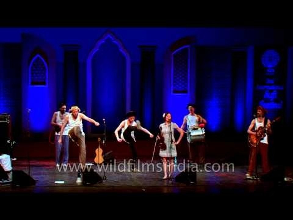 Alexey Belkin, Dmitri Shikardin and Luliia Usova performing with their group in india