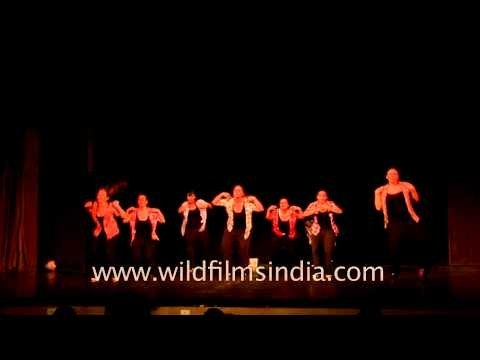 Swiss troops performing plays and dance in Delhi auditorium
