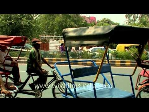 People travelling by rickshaw from Dilshad garden metro station