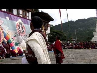 Bringing down Guru Rimpoche's thangkha on his birthday: Kurjey in Bhutan