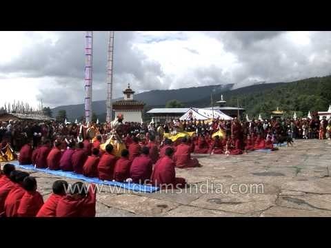 Bhutanese monks performing the Pa-Cham dance outside the moanstery in Bumthang, Bhutan