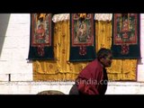 Rituals being performed during the unfurling of Thangka in Bhutan