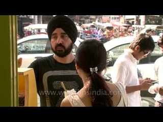 People enjoying Amritsari Lassi at Chandni Chowk, Old Delhi