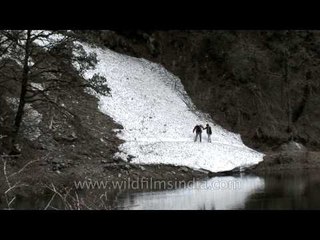Crossing spring snow tongues to reach Dodital