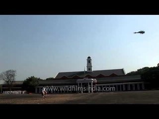 Helicopters fly over the Indian Military Academy parade
