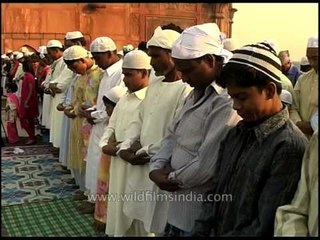 Muslim men pray at Jama Masjid, Old Delhi
