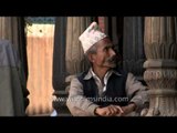 Man in traditional Nepali dress at Pashupatinath Temple in Nepal
