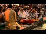 Hindu devotees performing puja during Maha Kumbh at Allahbad