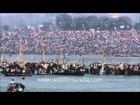 Crowds mill around Maha Kumbh on the Ganga, on Maha Shivratri