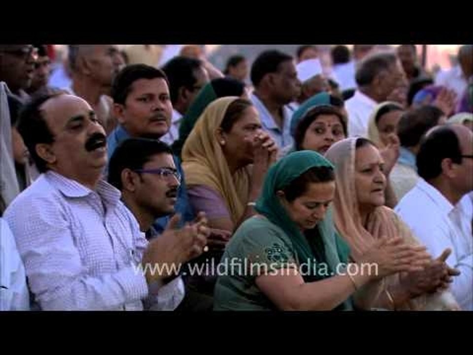 Devotees singing religious bhajans during Maha...