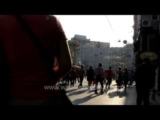 People walking down a busy pedestrian street in Istanbul