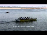 Devotees enjoy boating at Varanasi ghat