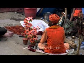Sadhu Baba having tea with foreigner friend