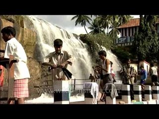 locals at Thirparappu Falls, Tamil Nadu