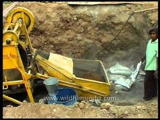 Concrete mixer machinery at construction site