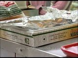 Watch the packing of mithai at Evergreen Sweets