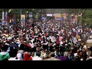 Devotees going towards the river bed in Maha Kumbh Mela