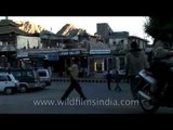 Locals and tourists explore Ladakh market on foot