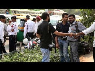 Media reporting live transmission of protest outside Police Head Quarters, Delhi