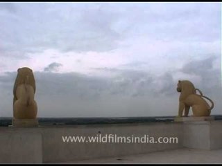 Statues of a lion at the Shanti Stupa in Dhauli