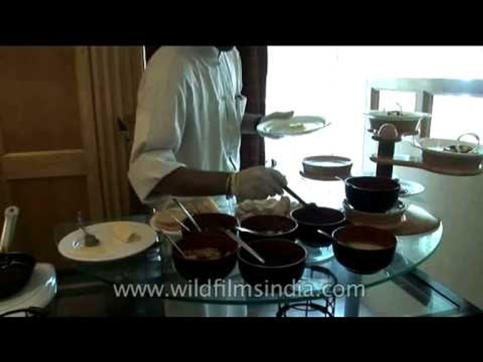 Chef preparing delicious sweet dish