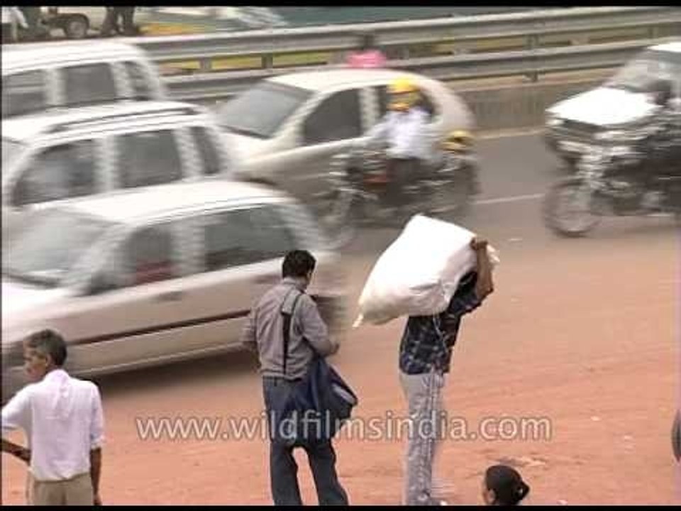 Commuters waiting for the bus in the bus-stand