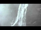 Waters of Jog falls cascading down the steep cliff in Karnataka