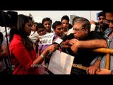 Media persons interviewing angry protesters outside AIIMS, New Delhi