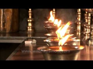 Burning oil lamps in a gompa