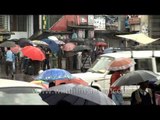 Under their umbrellas in Shillong, Meghalaya