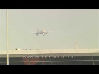 Delhi airport with flights landing on main runway
