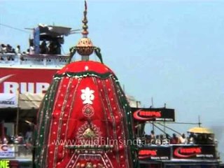 Scores of devotees wait to pull the chariots at the Ratha Yatra Festival of Chariot