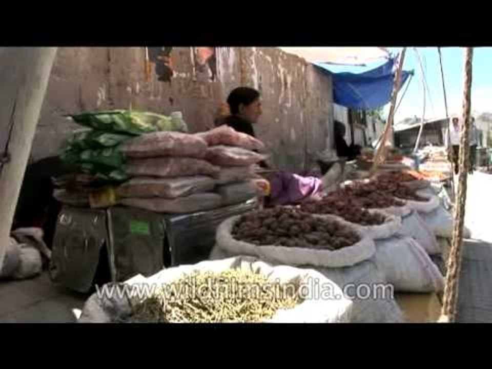 Spices and nuts in sacks on sale in Ladakh