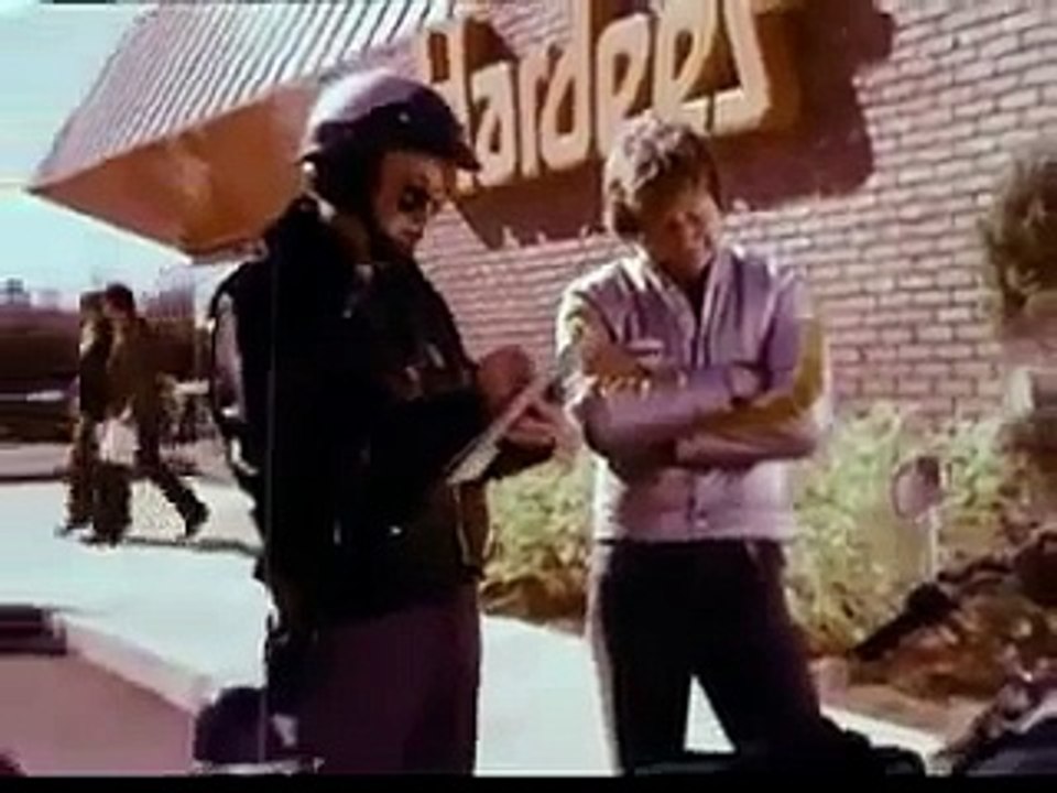 1970s HARDEES COMMERCIAL ~ BRIBING A COP WITH A HARDEE'S LUNCH AND A GOOD LOOKING GUY