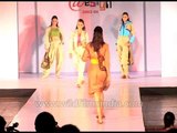 Delhi fashion show: Models wear golden colour outfits