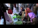 Buying fresh vegetables from smiling Ladakhi women