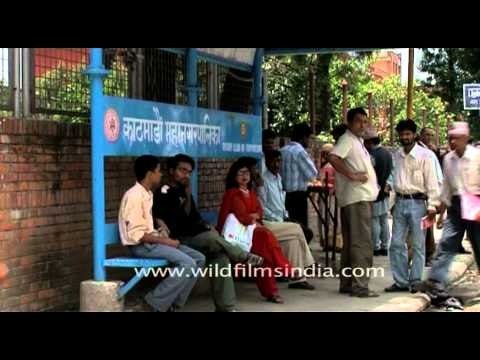 People waiting for the Bus, at Bus shelter in Kathmandu
