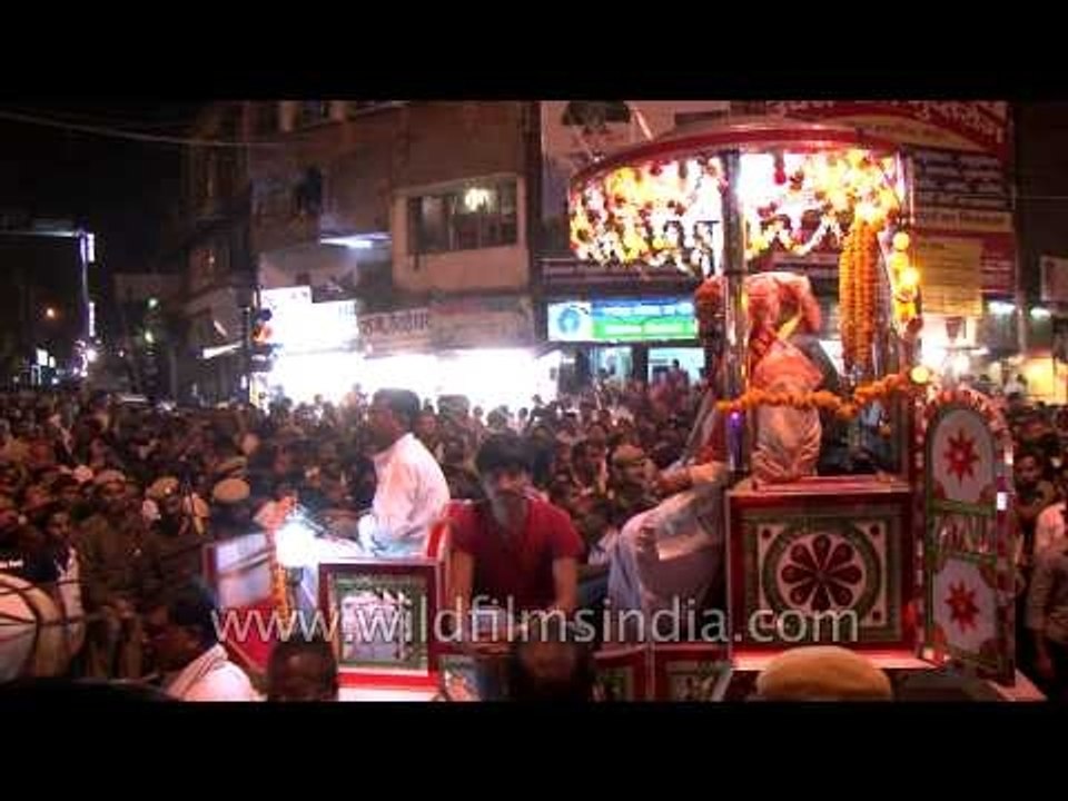 Horse chariots driven amidst massive crowds in Varanasi during Mahasivarathri Procession