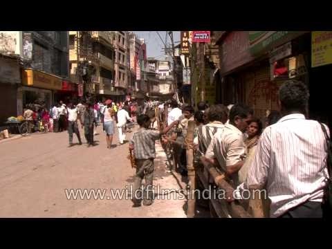Devotees wait in queues to enter Kashi Vishwanath temple on Mahashivaratri, Varanasi