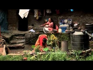 Nepali women performing their household work